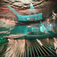 Illustration for article titled The Coolest Trampoline On Earth Is Suspended Inside a Huge Cavern
